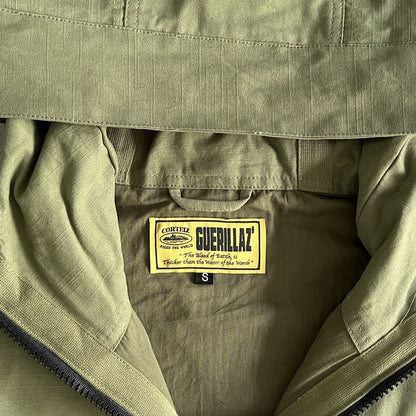 Veste militaire Corteiz Storm Jacket avec poche inclinée - Vert