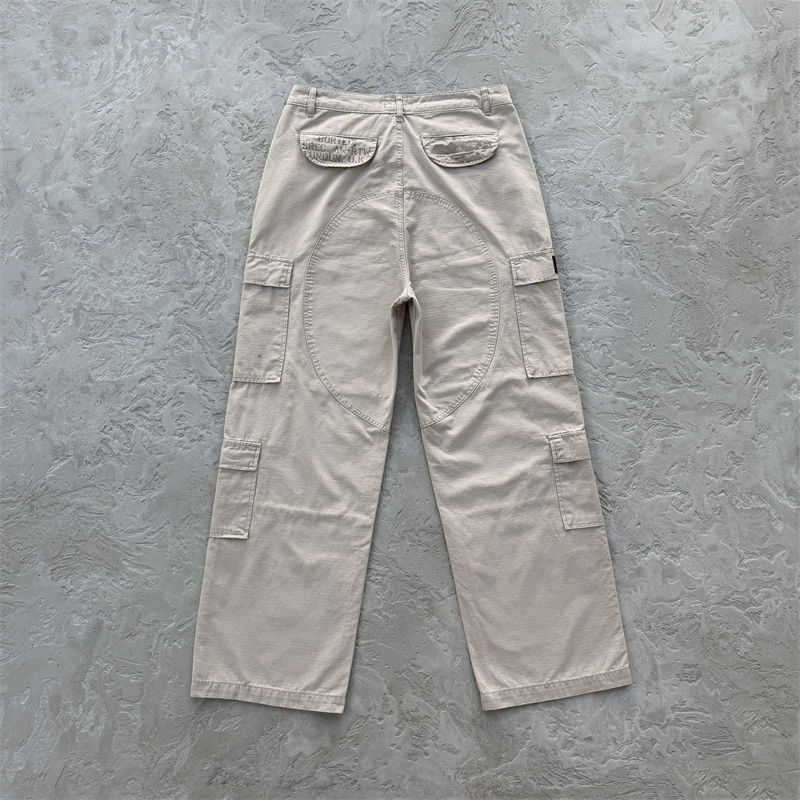 Tan Corteiz Guerillaz Cargo Pants shown from the back