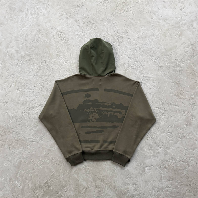 Olive Corteiz Guerillaz Ripstop Zip Hoodie shown from the back