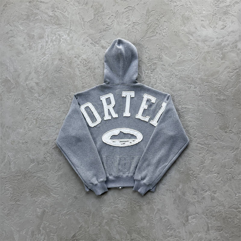 Grey Corteiz Lundun Stitch Zip Hoodie shown from the back